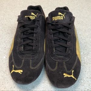 Brown and Gold Suede Pumas Men’s 8 Woman’s 10